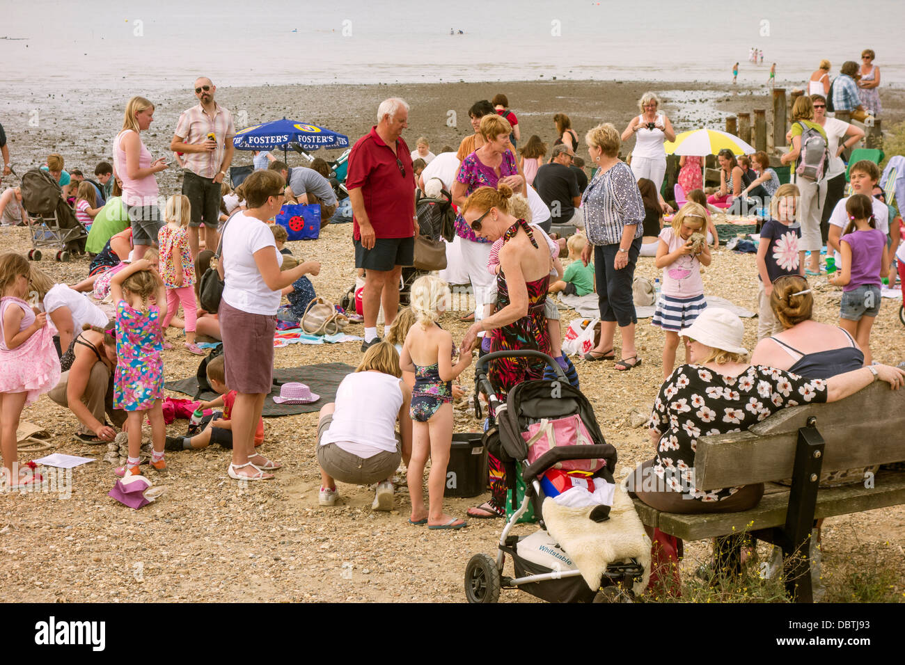 Family Day Out at the Seaside Playing Relaxing on the beach Stock Photo