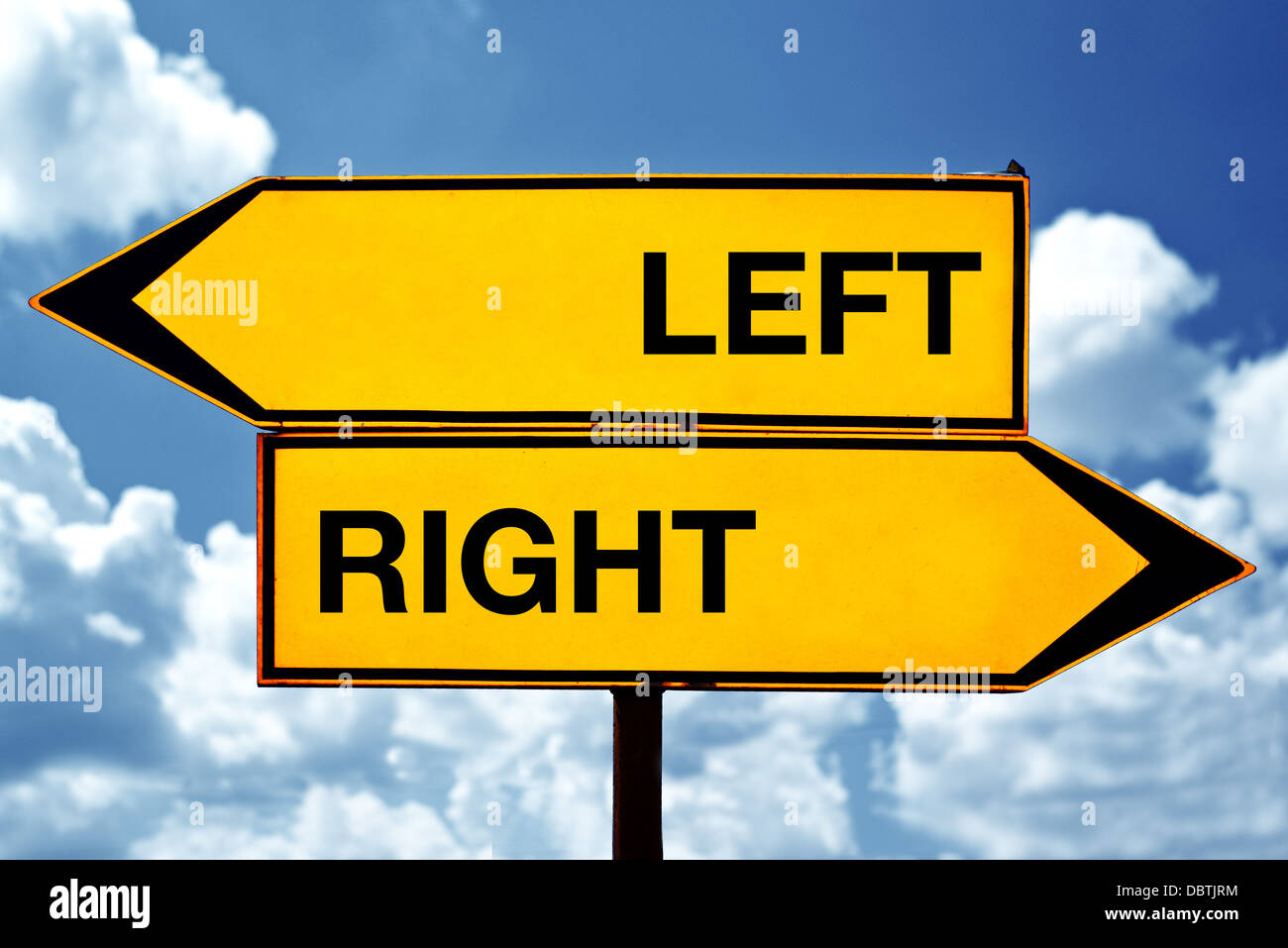 Left or right, opposite signs. Two opposite signs against blue sky background. Stock Photo