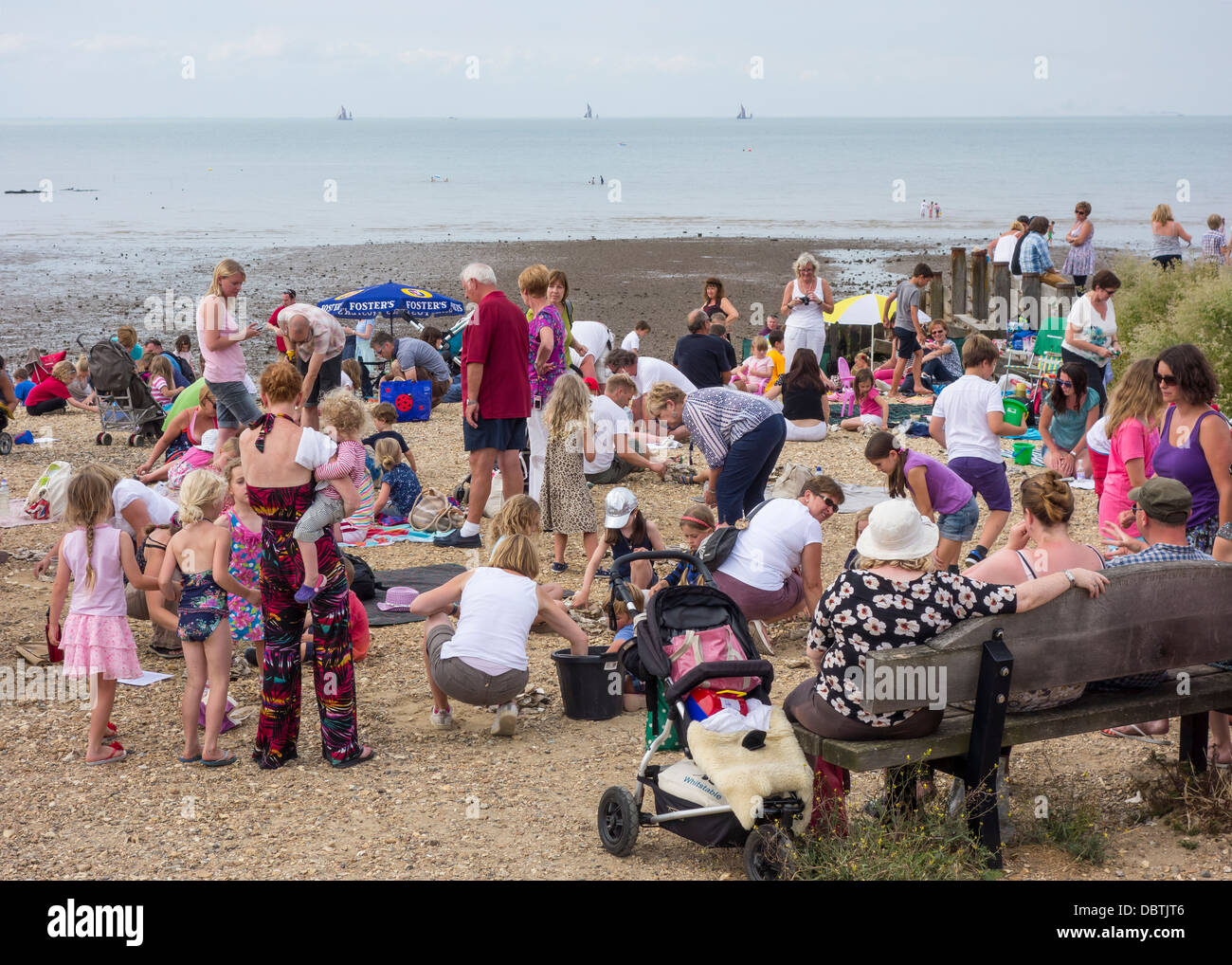 Family Day at the Seaside.  Playing and Relaxing on the beach. Stock Photo