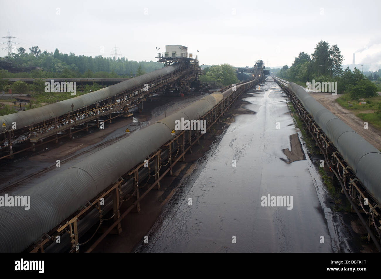 Conveyer belts transporting ignite (brown coal) from a surface mine to a power station Stock Photo