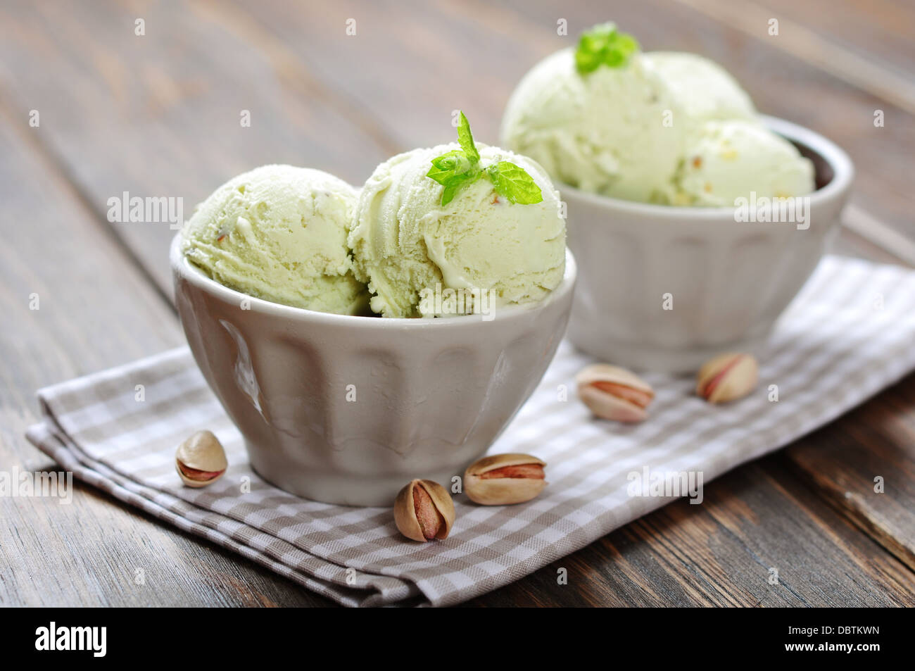 pistachio ice cream with mint and fresh pistachio Stock Photo