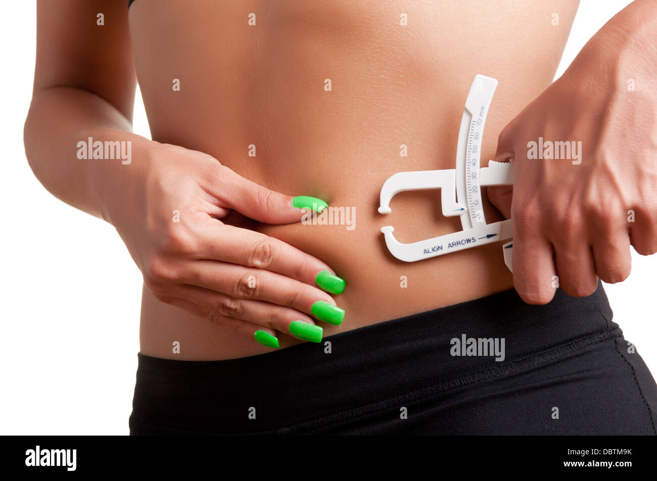https://c8.alamy.com/comp/DBTM9K/woman-measuring-her-body-fat-with-a-body-fat-caliper-isolated-in-white-DBTM9K.jpg