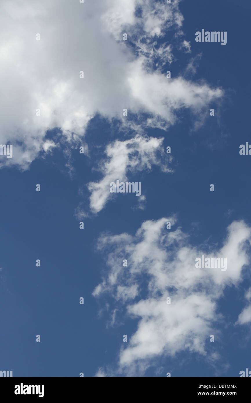 A group of Altocumulus clouds with a blue sky Stock Photo - Alamy