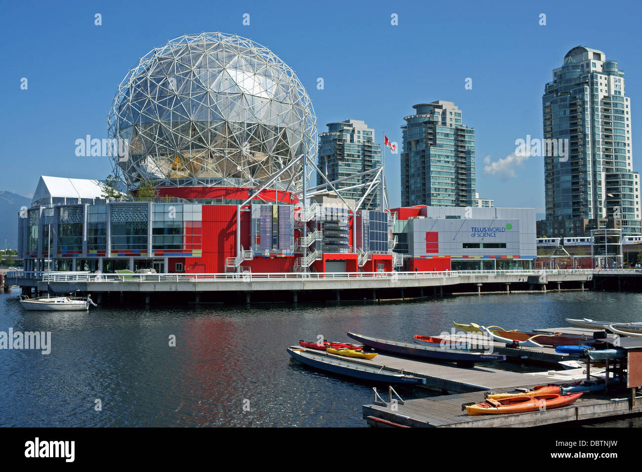 Science World or Telus World of Science and boats moored at False Creek in Vancouver, BC, Canada Stock Photo