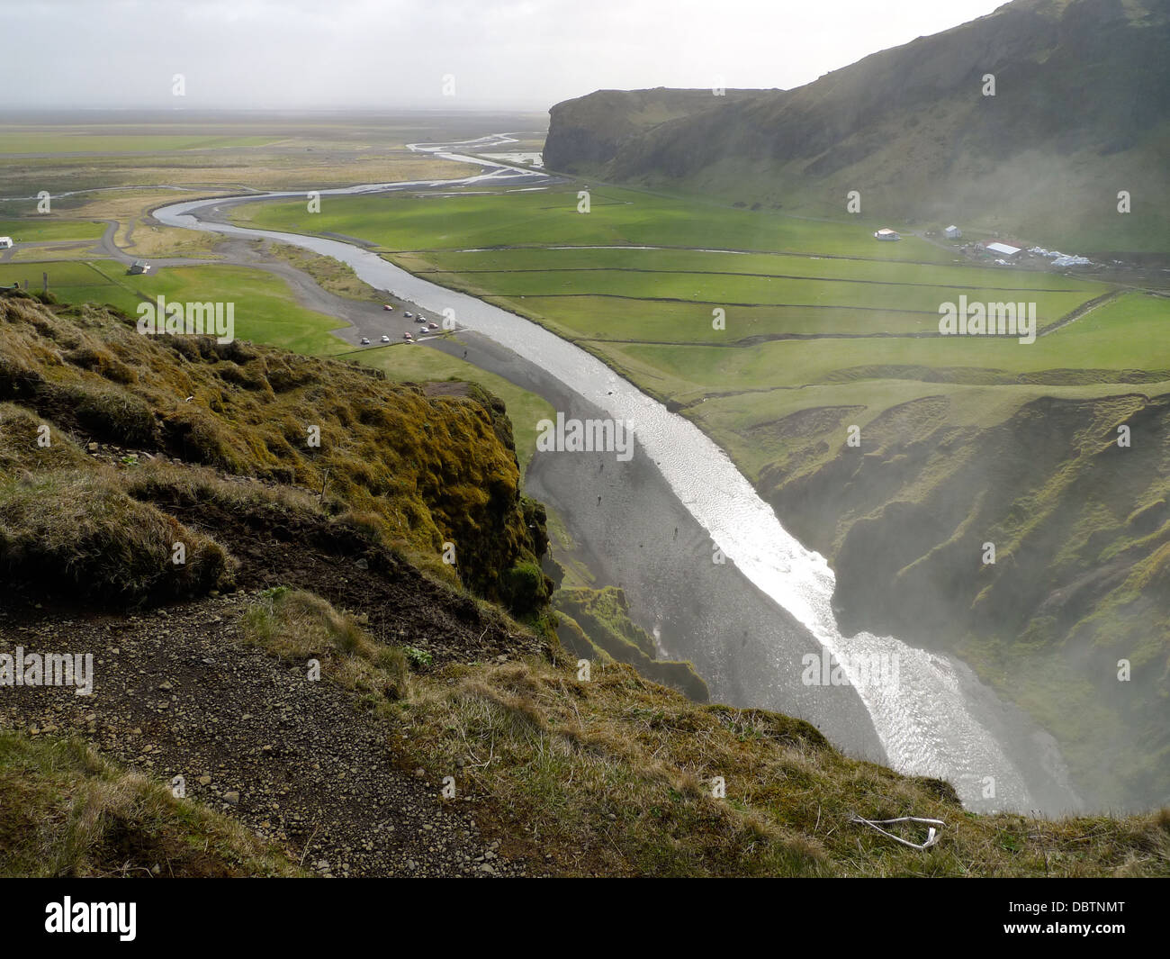 The view from the top of Skogafoss waterfall in southern Iceland. Stock Photo