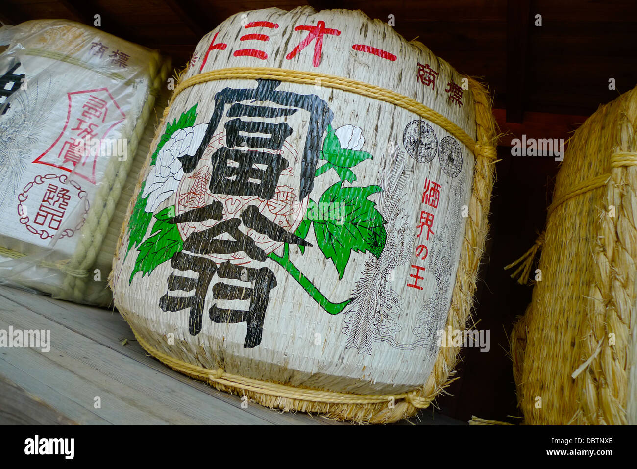 Sake barrels (kazaridaru) at a shrine in Japan. Stock Photo