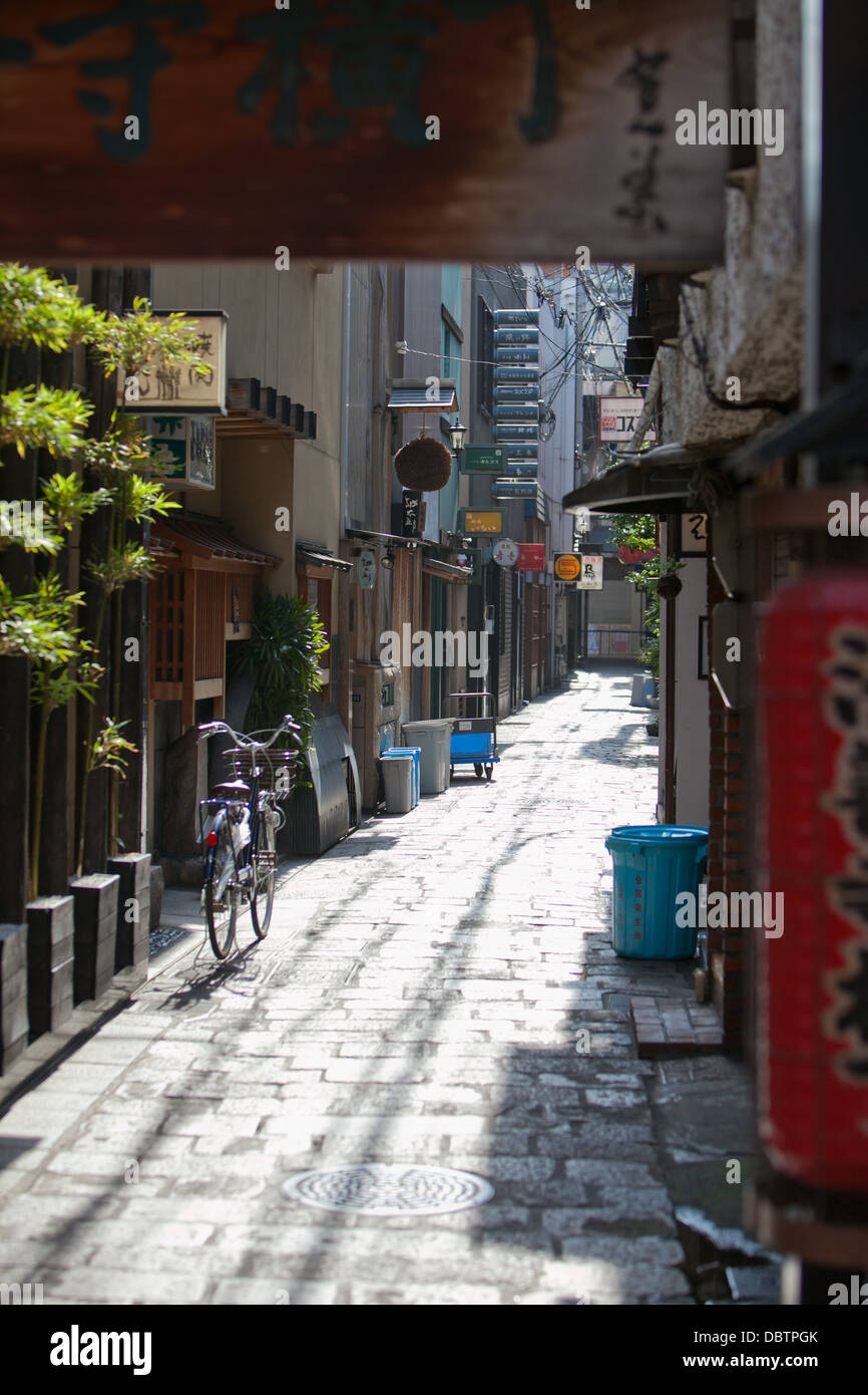 Street detail in Osaka, Japan - a bike on a side street Stock Photo