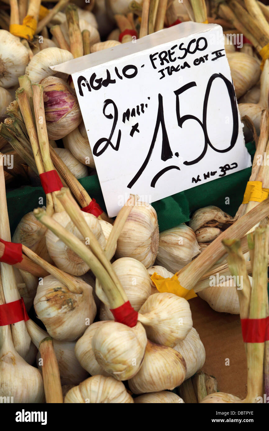 Garlic on display at a market along Viale Papiniano in Milan Italy