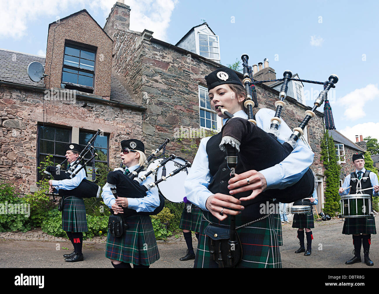 Pretty girl playing the bag Pipes.Scotland. Stock Photo