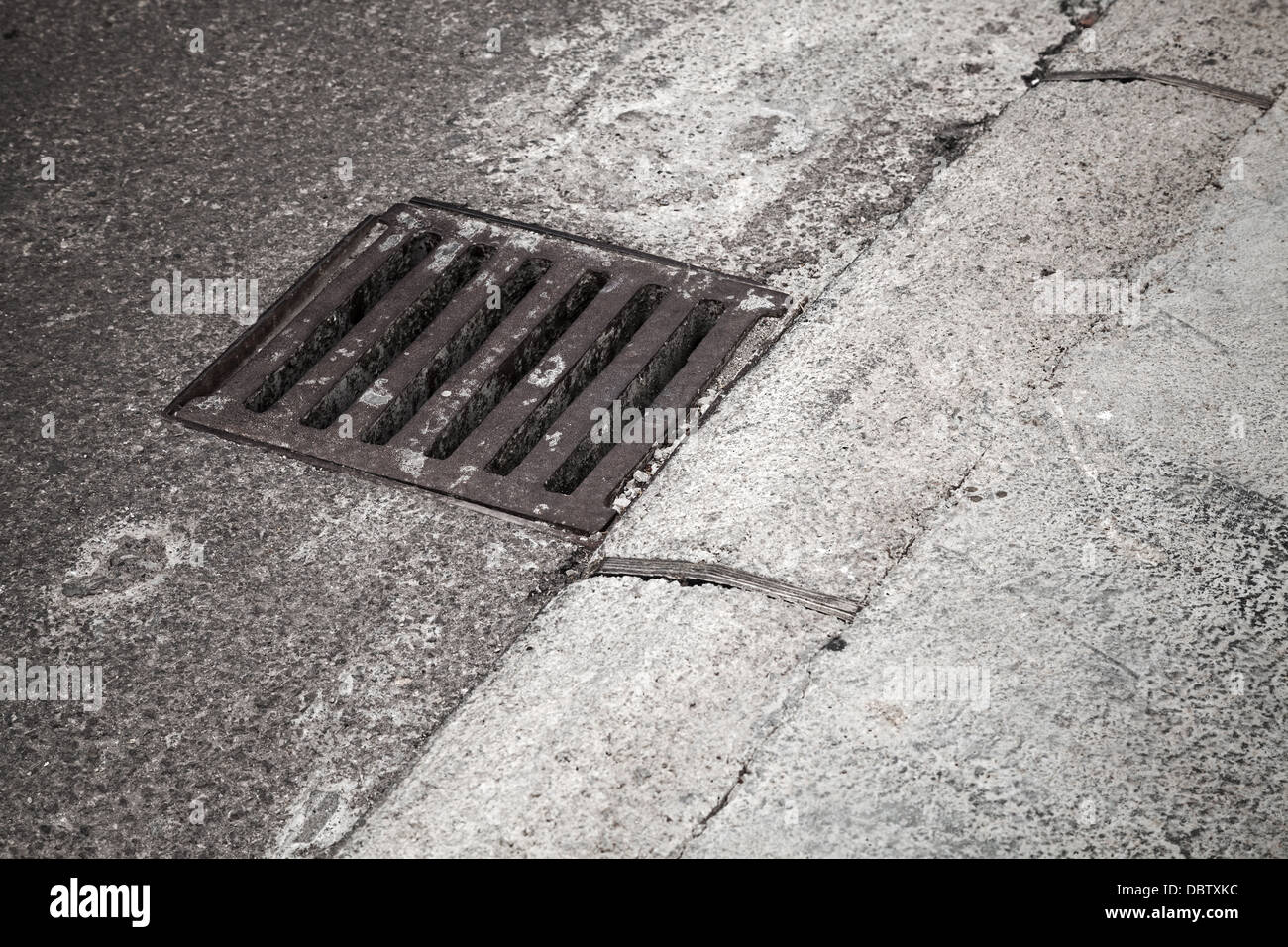 Drainage cover on the road side Stock Photo
