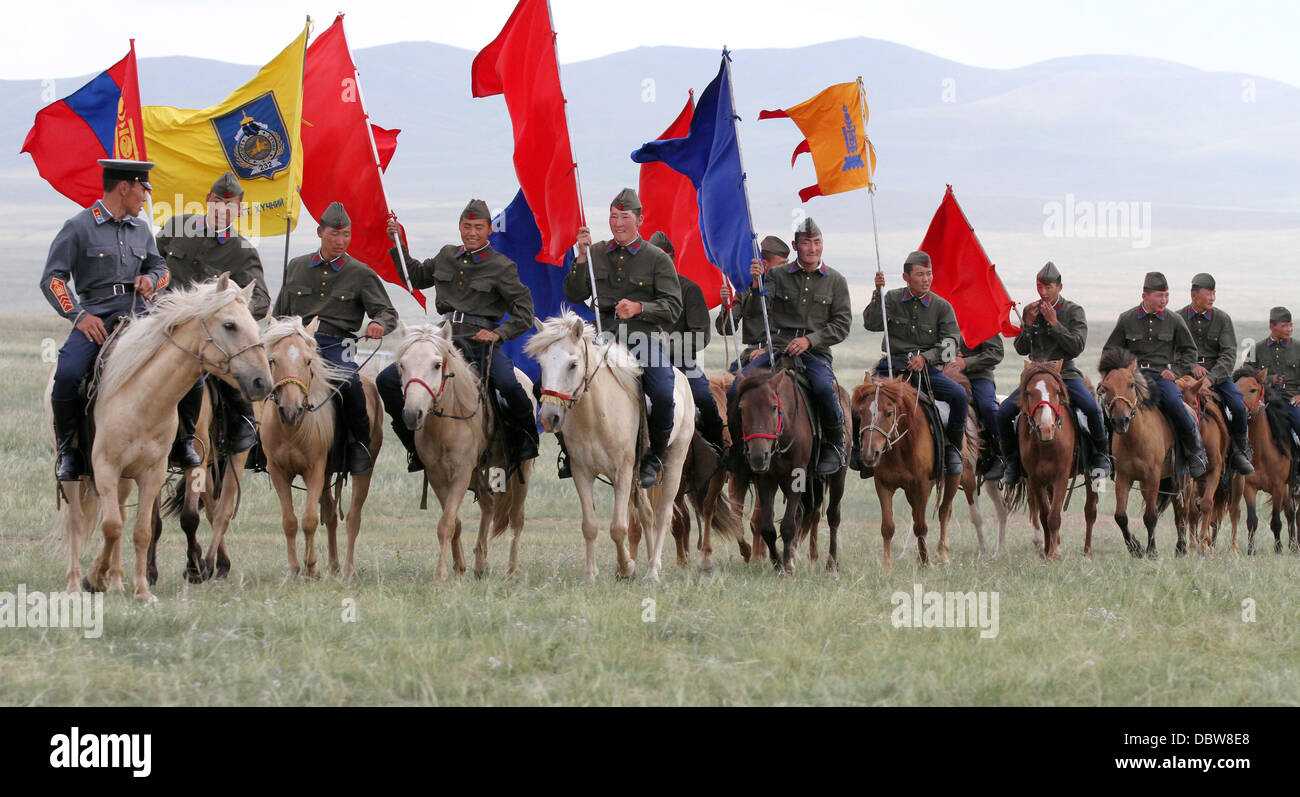 Members of the Mongolian Armed Forces 234 Cavalry Unit give a demonstration of their riding skills during the opening ceremony of Exercise Khaan Quest August 3, 2013 in Five Hills Training Area, Mongolia. Stock Photo