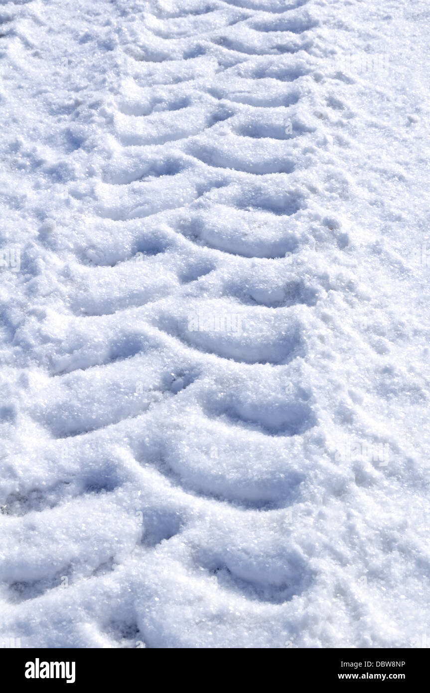 Details of Tire / Tyre Tracks in the Snow Stock Photo