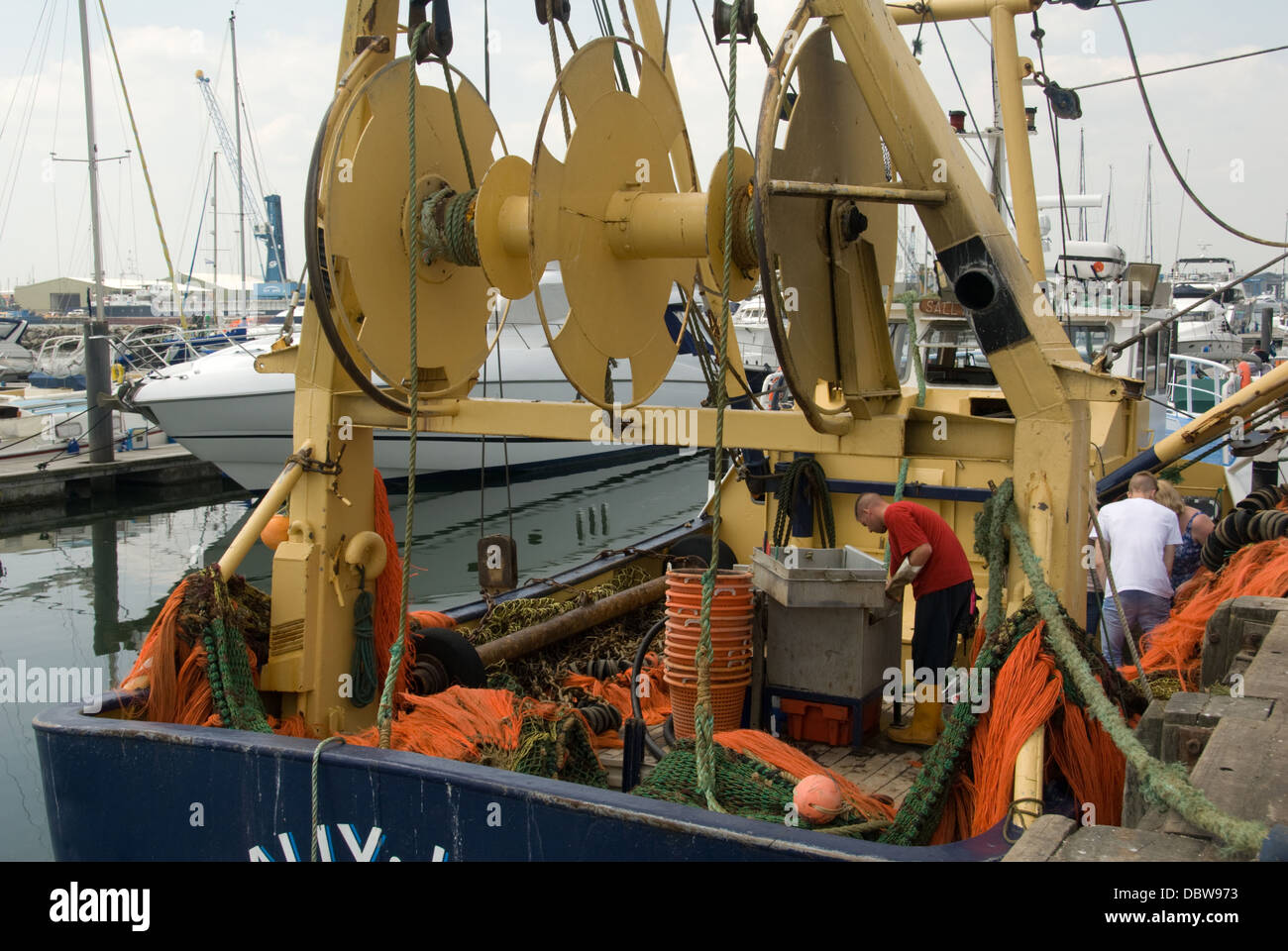 DORSET; POOLE HARBOUR; FISHING VESSEL "SALLY JANE"AND CREW CHECKING