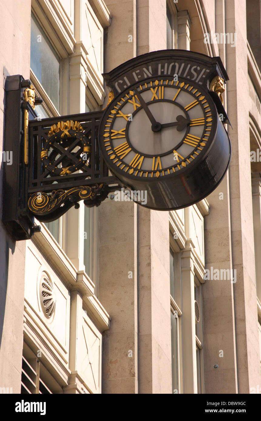 Exterior wall clock on a London building Stock Photo Alamy