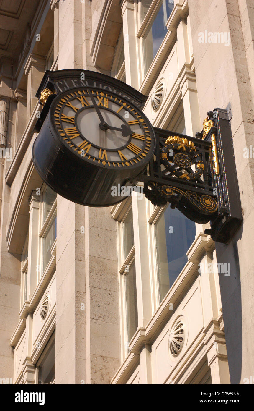 Exterior wall clock on a London building Stock Photo Alamy