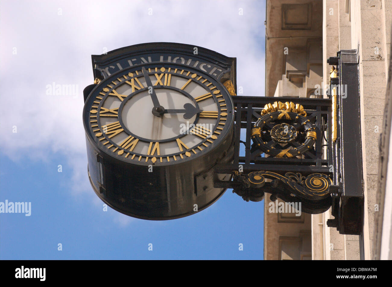Exterior wall clock on a London building Stock Photo Alamy