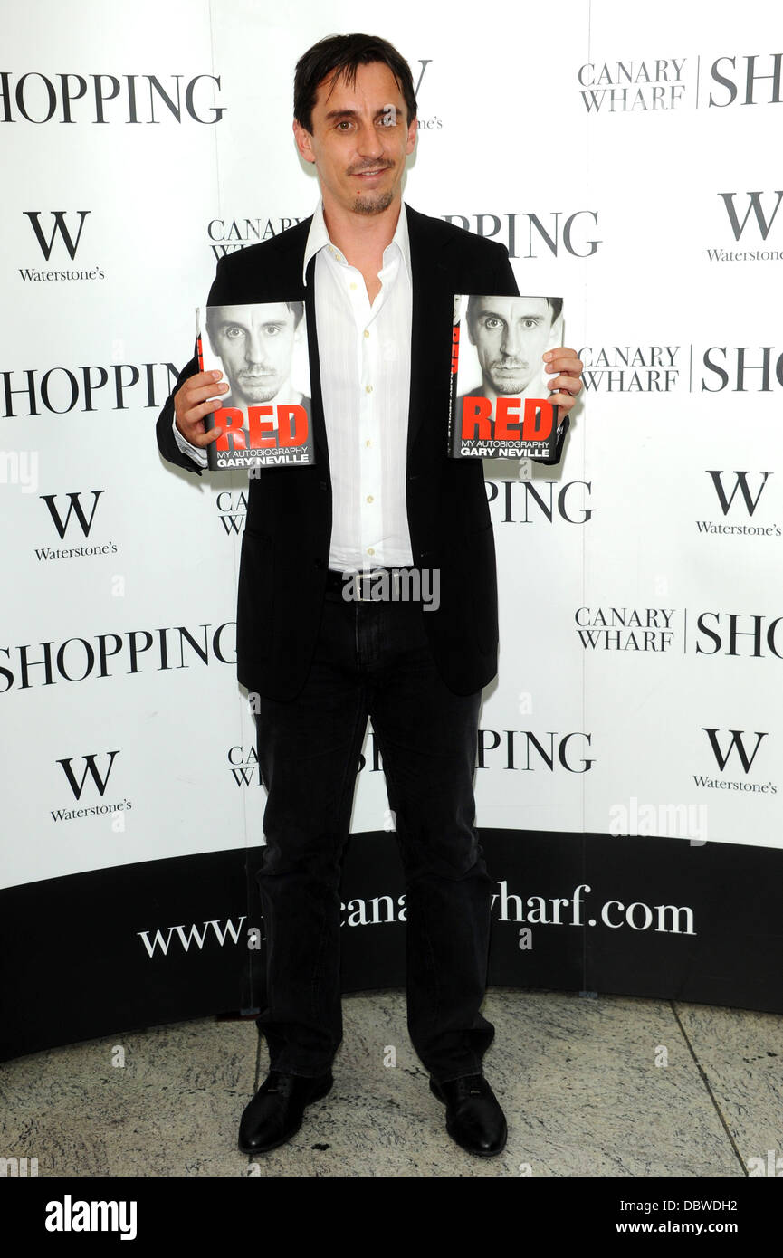 Gary Neville signs copies of his autobiography 'Red' at Waterstones, Canary London, England - 01.09.11 Stock Photo - Alamy