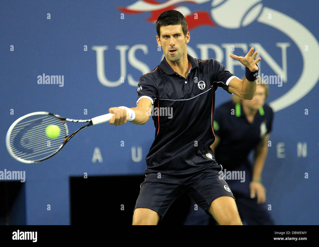 Novak Djokovic, returns a fore hand during his match against Carlos Berlocq,  ARG, Thursday September 1, 2011, on Day 4, of the US Open Tennis  Tournament, on Louis Armstrong Stadium, in Flushing