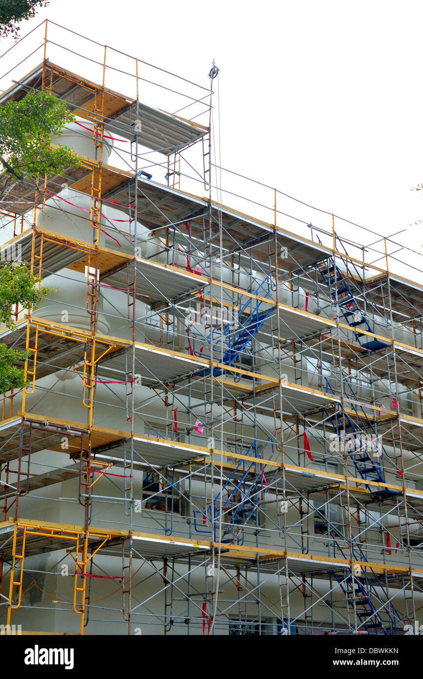 Scaffolding on side of building Stock Photo
