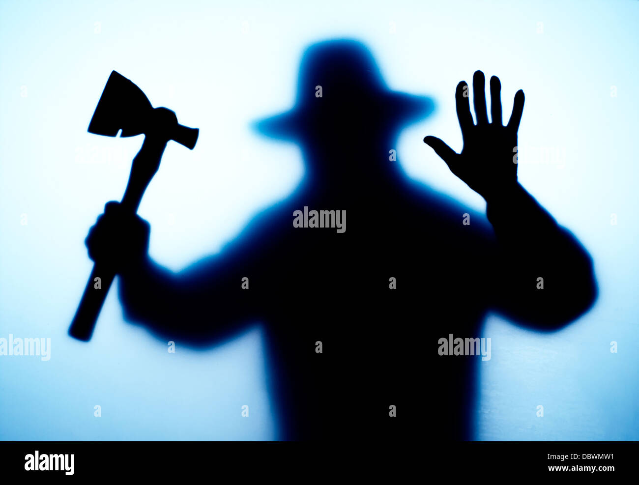 computer generated stalker bad guy with hatchet threatening pose Stock Photo