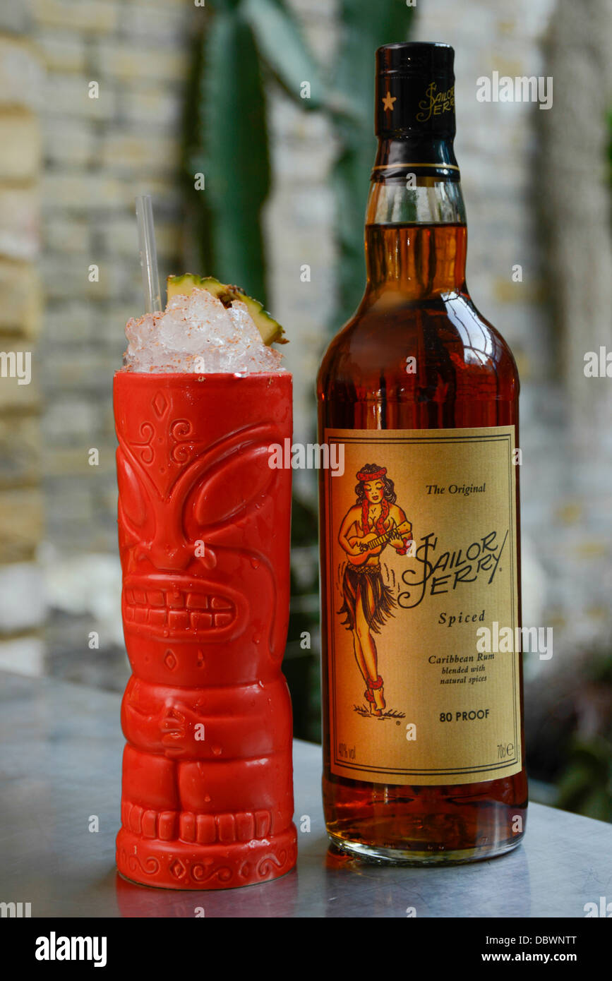 Sailor Jerry rum cocktail with bottle Stock Photo