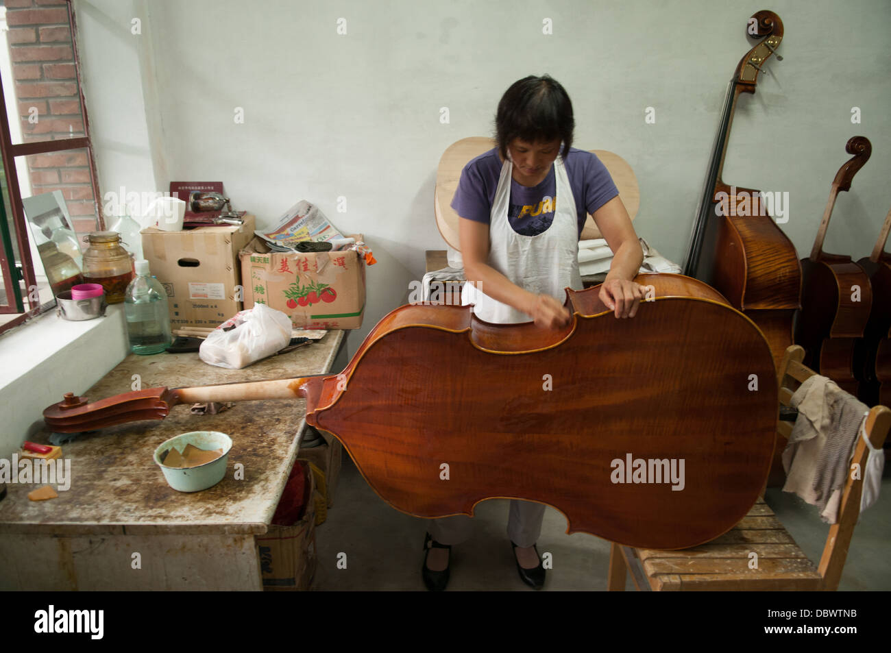 Double-bass maker, Beijing, China Stock Photo - Alamy