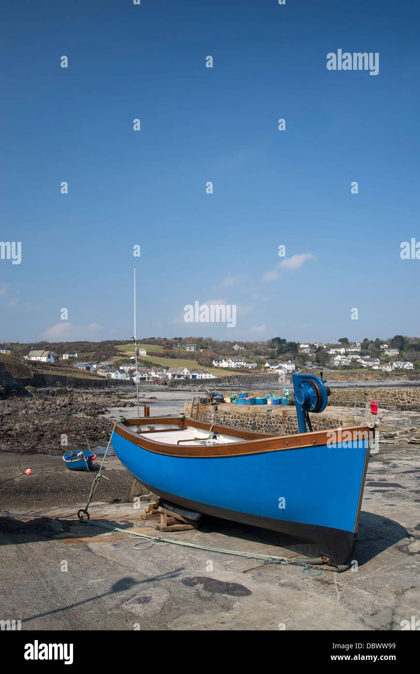 Harbour at low tide with fishing boats at Coverack England Stock Photo ...