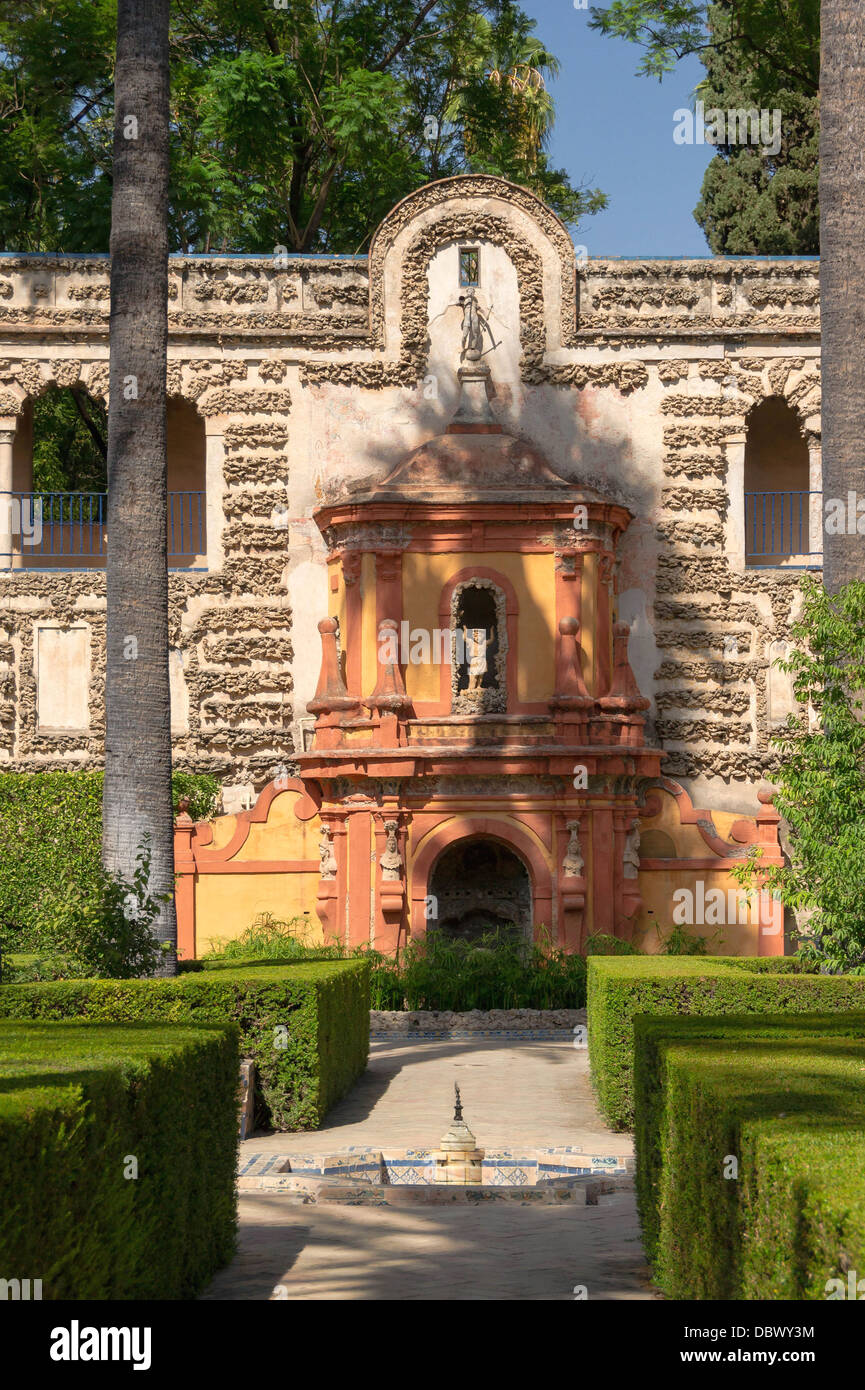 Fountain & baroque grotto in the garden of the Alcoba's arbour, gardens of the Alcazar, Seville, Spain. Stock Photo