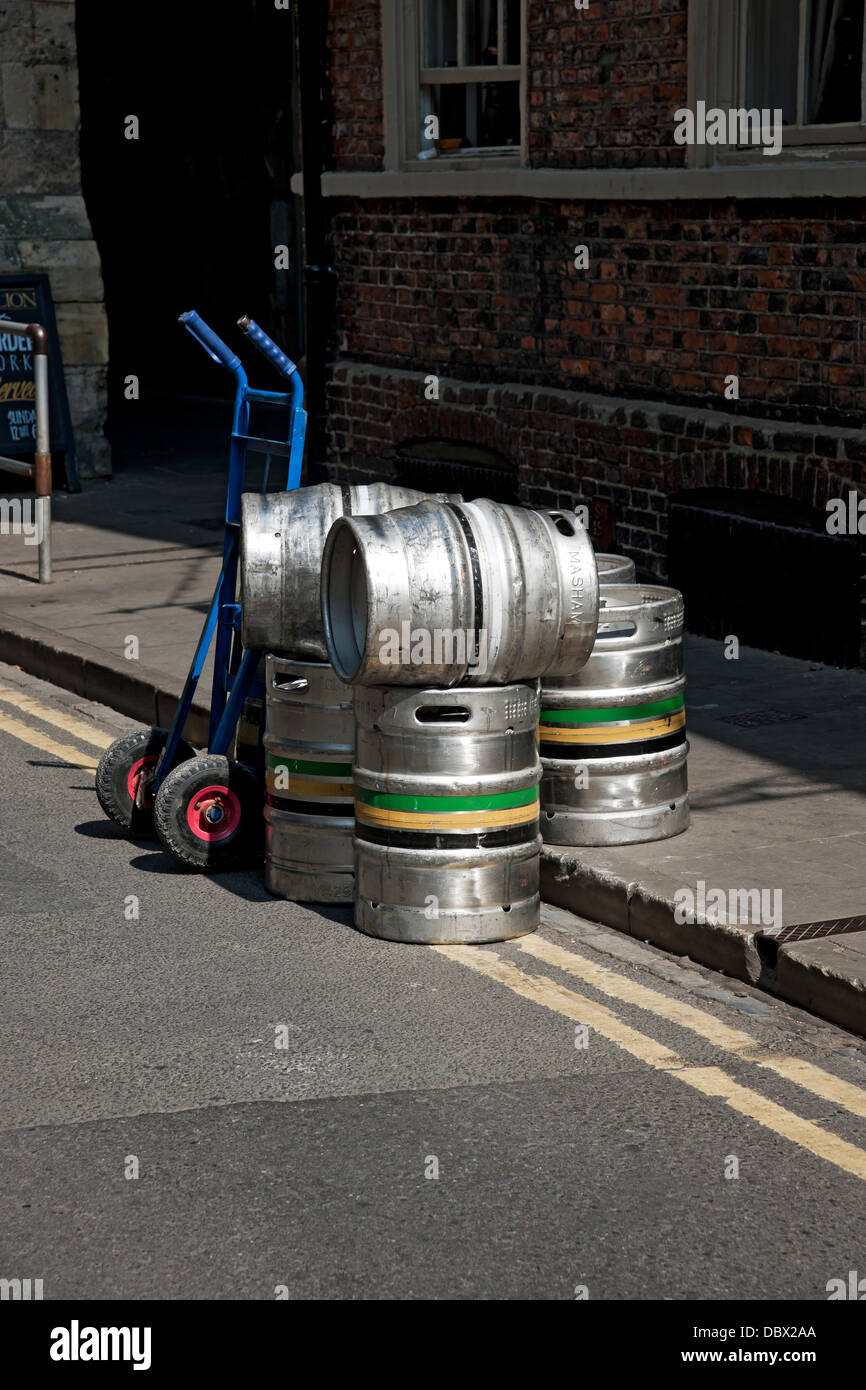 Aluminium aluminum metal beer kegs keg barrels outside pub bar in the city town centre York North Yorkshire England UK United Kingdom GB Great Britain Stock Photo