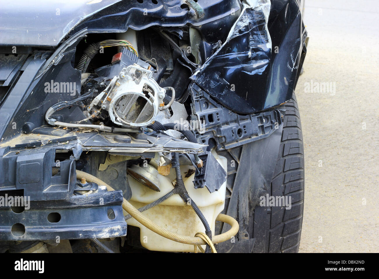 Crashed Car Close Up. The Front Part Is Severely Damaged Stock Photo 