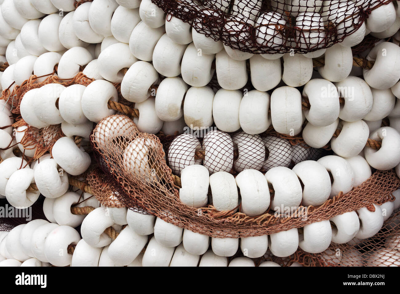 fishing corks on a fishing net Stock Photo