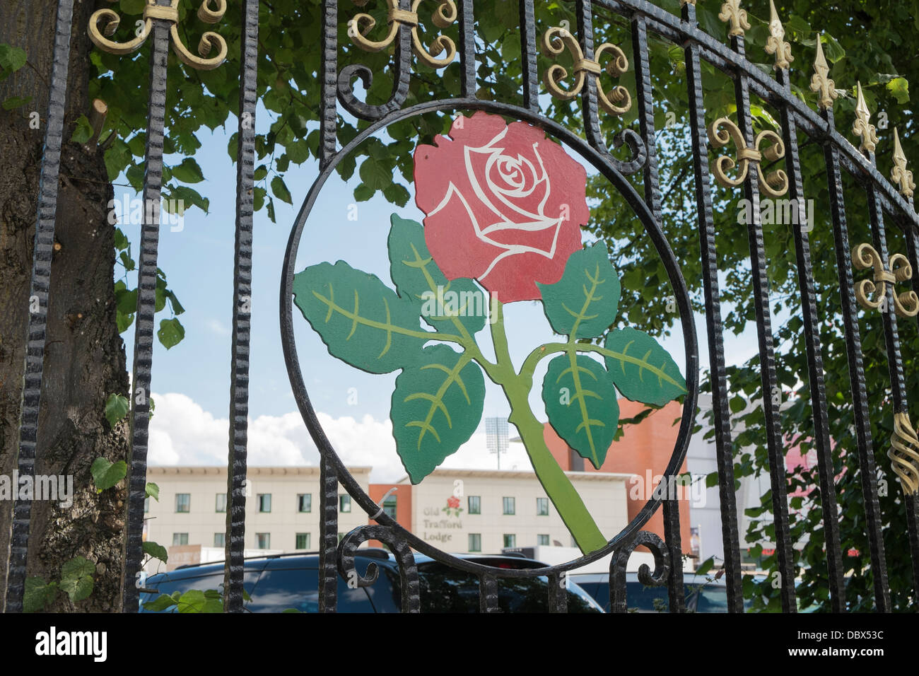Red Rose symbol on iron railings around Emirates Old Trafford at Lancashire County Cricket Ground in Manchester England UK Stock Photo