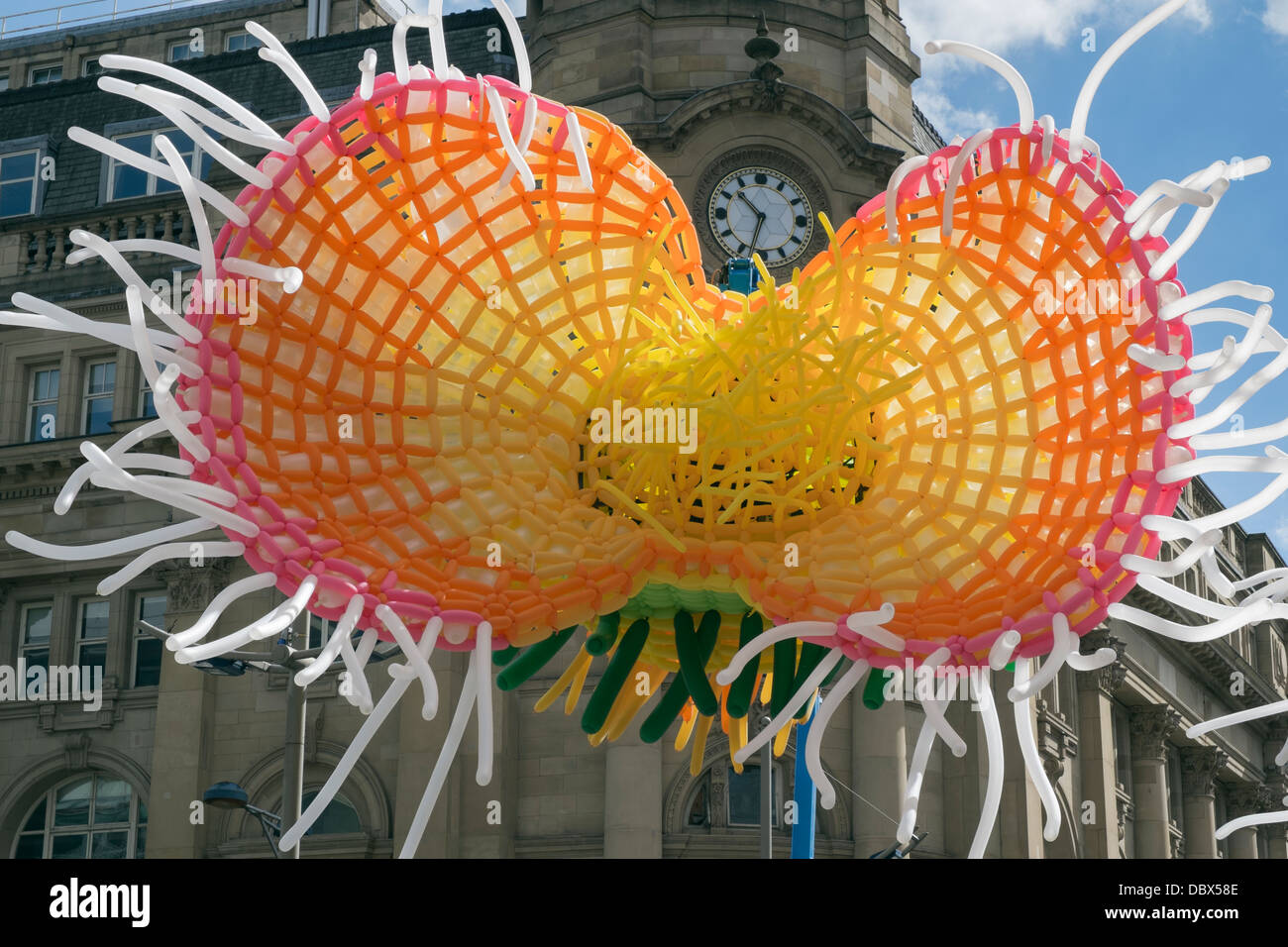 Large flower made out of balloons to advertise the Dig for the City event in Manchester, Lancashire, England, UK, Britain Stock Photo