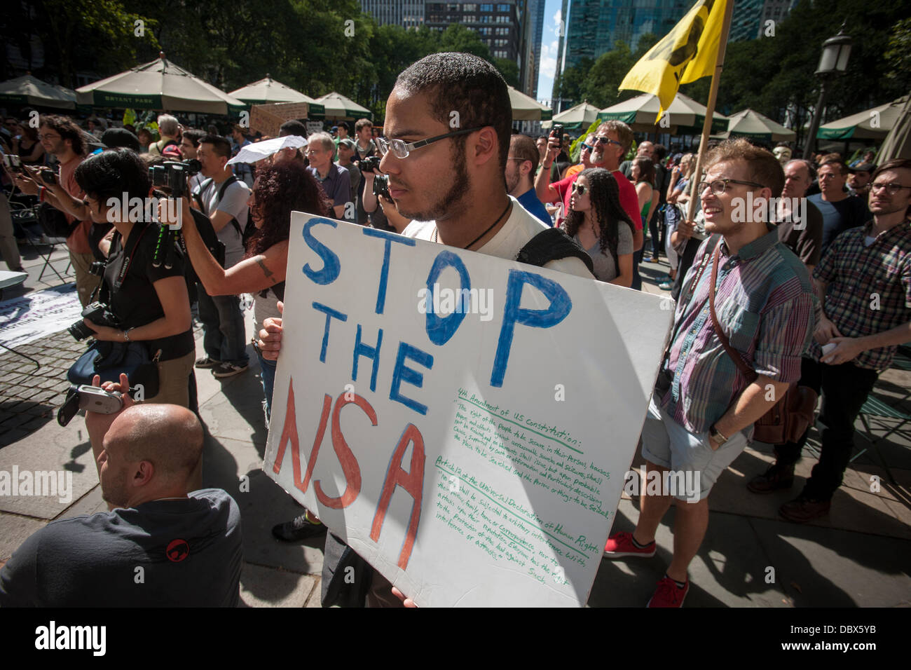 New York, New York. 04th Aug, 2013. Protesters in midtown Manhattan in New York demonstrate against the National Security Agency's surveillance of Americans' email and telephone conversations on Sunday, August 4, 2013. The protest was organized by a group called 'Restore the Fourth' referring to the Fourth Amendment of the Constitution which protects citizens against unreasonable searches by the government. Many citizens are opposed to the NSA activities and the events which took place around the country were called '1984 Day'. Credit:  Richard Levine/Alamy Live News Stock Photo
