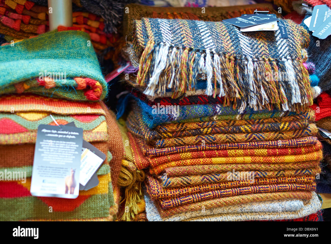 Pile of colourful alpaca wool scarfes, Miraflores district of Lima, Peru. Stock Photo