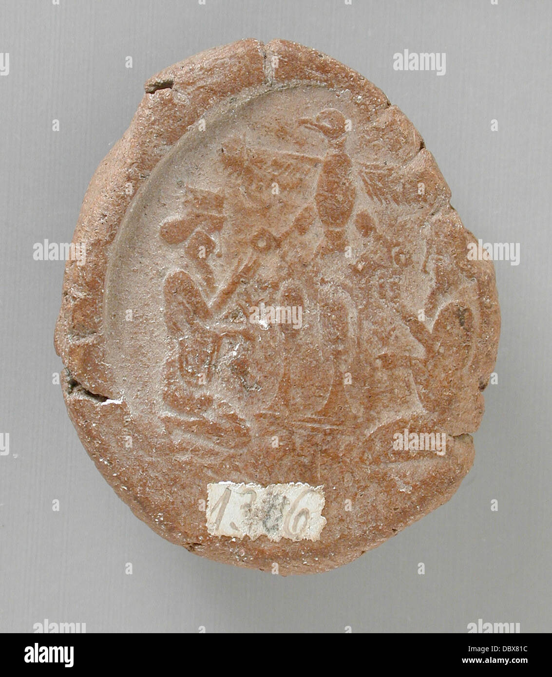 Seal Impression with Persian Scene of the King and the Winged God Ahuramazda M.80.202.893 Stock Photo