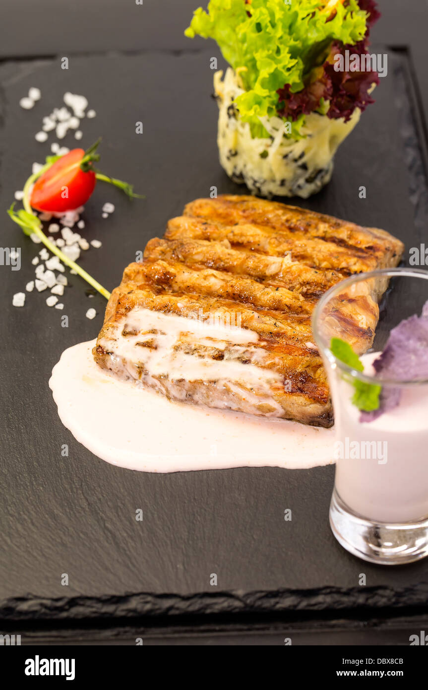 Catfish steak cooked on the grill Stock Photo Alamy