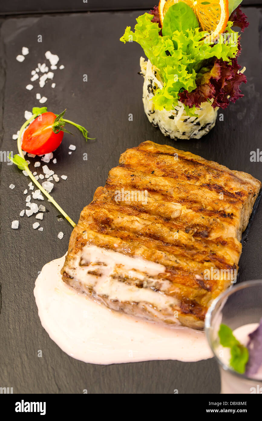 Catfish steak cooked on the grill Stock Photo Alamy