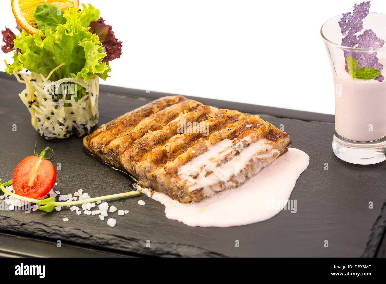 Catfish steak cooked on the grill Stock Photo Alamy