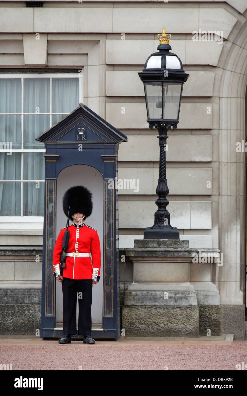 Sentry in traditional uniform at Buckingham Palace, London, UK Stock