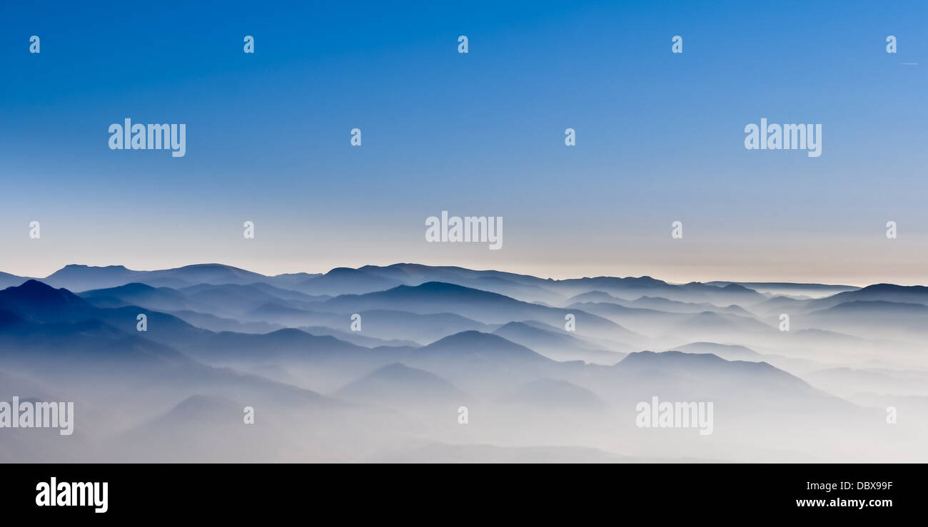 Misty mountain hills misty landscape Stock Photo - Alamy