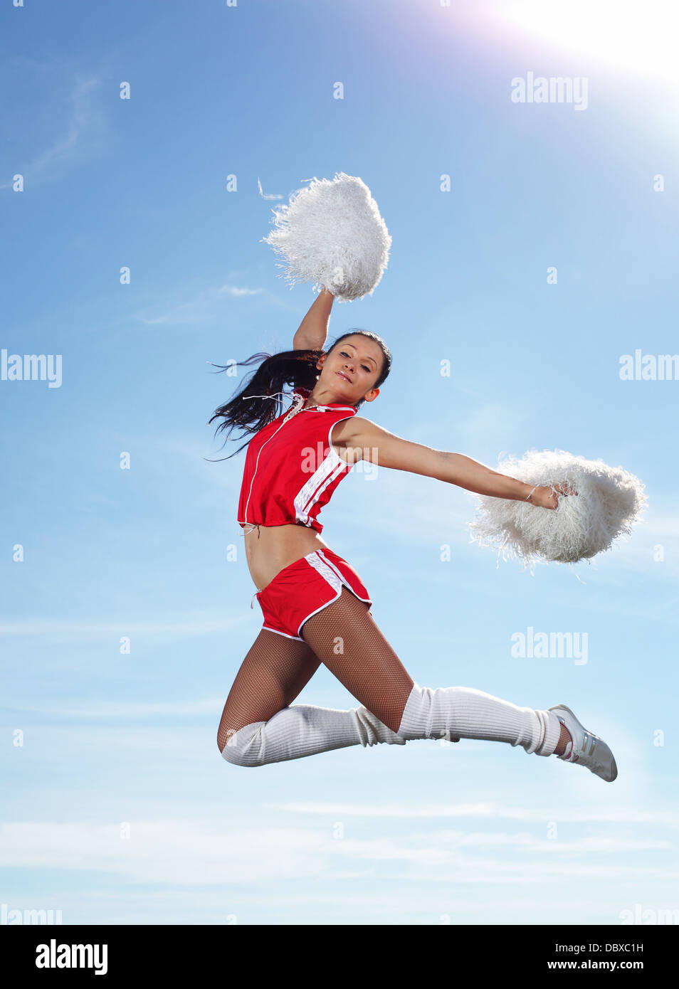 Young female cheerleader Stock Photo - Alamy