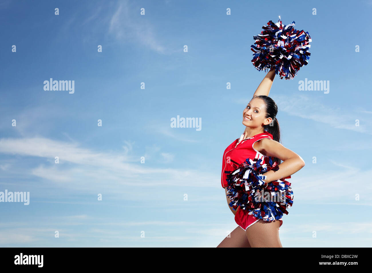 Young female cheerleader Stock Photo - Alamy