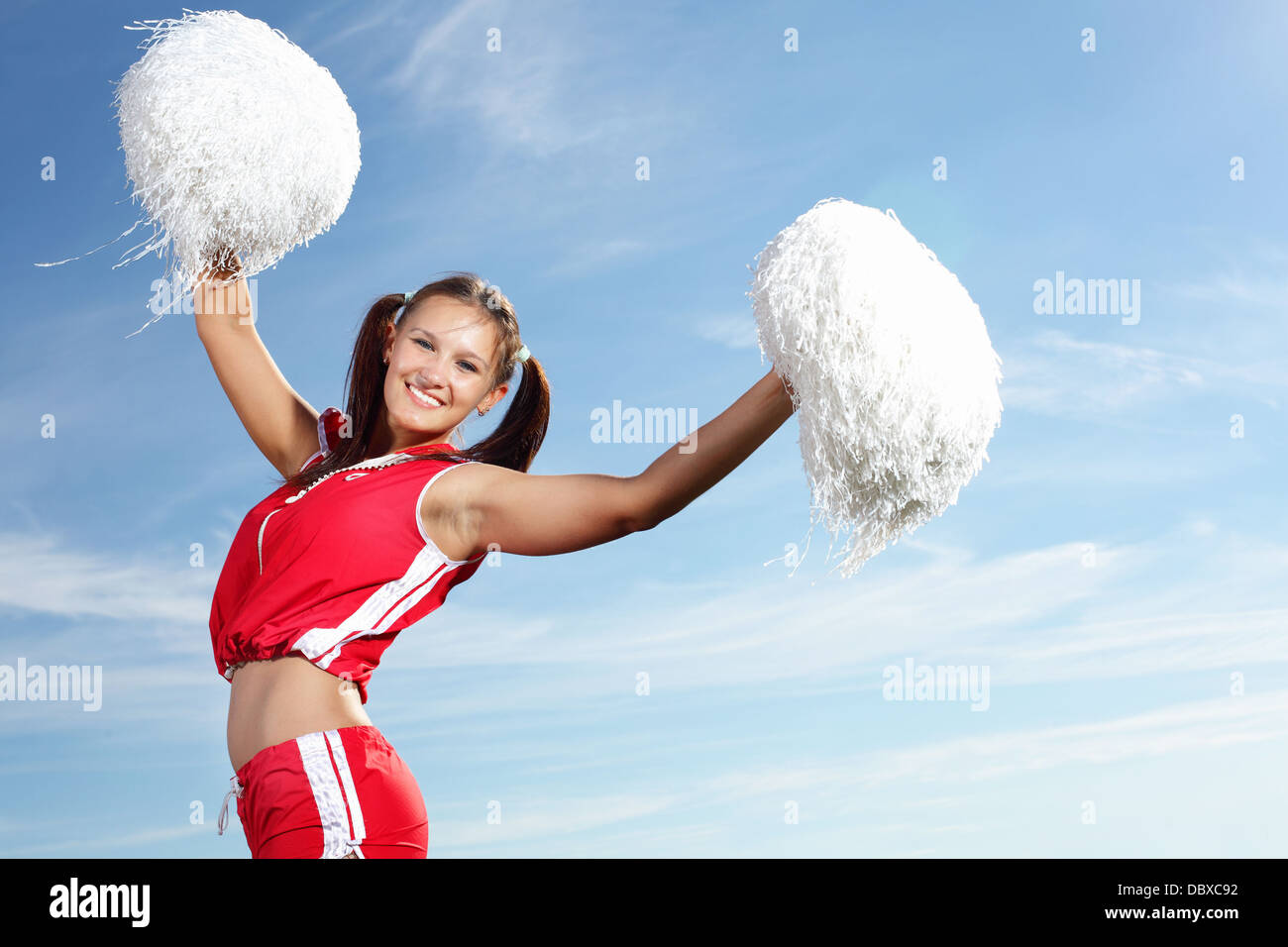 Young female cheerleader Stock Photo - Alamy
