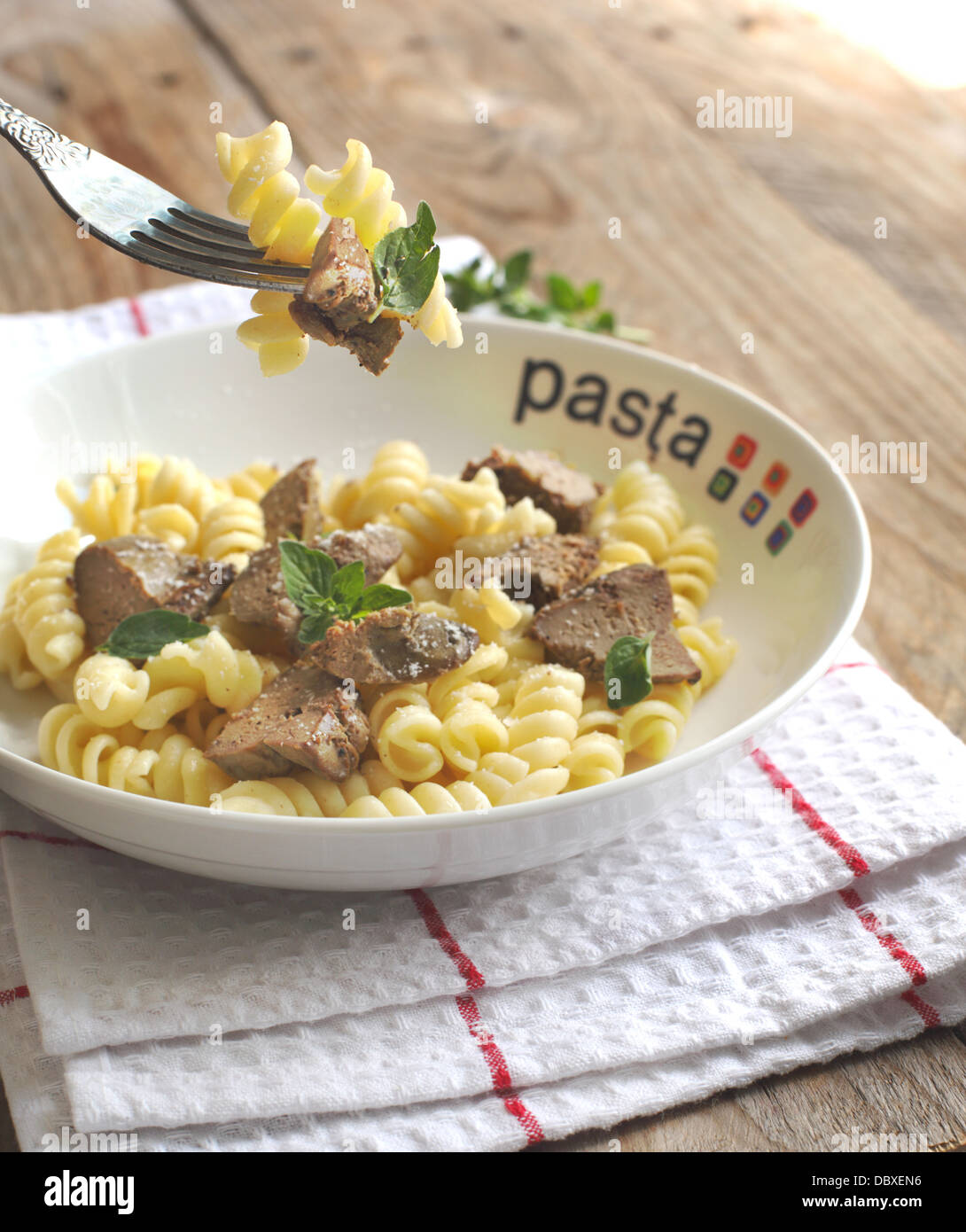 Pasta. Fusilli pasta with chicken liver, oregano and parmesan cheese Stock Photo Alamy