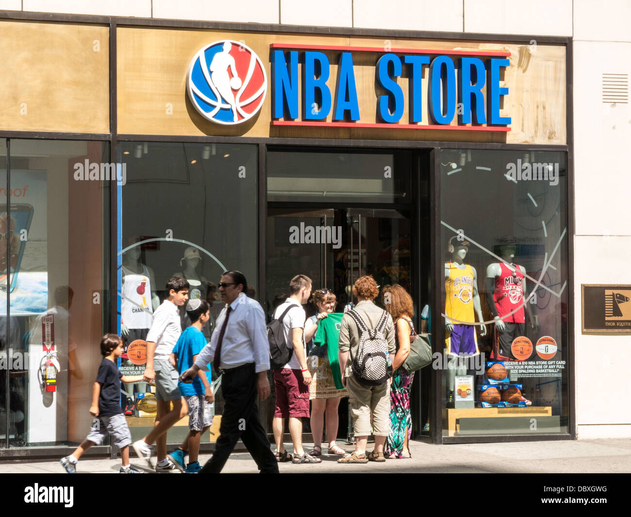 MANNEQUINS WITH COLORFUL CLOTHES INSIDE NBA STORE IN MANHATTAN NEW