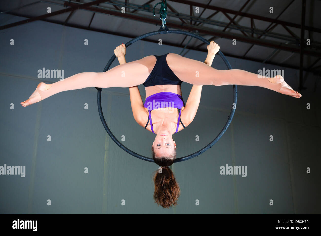 Gymnast performing aerial exercises Stock Photo