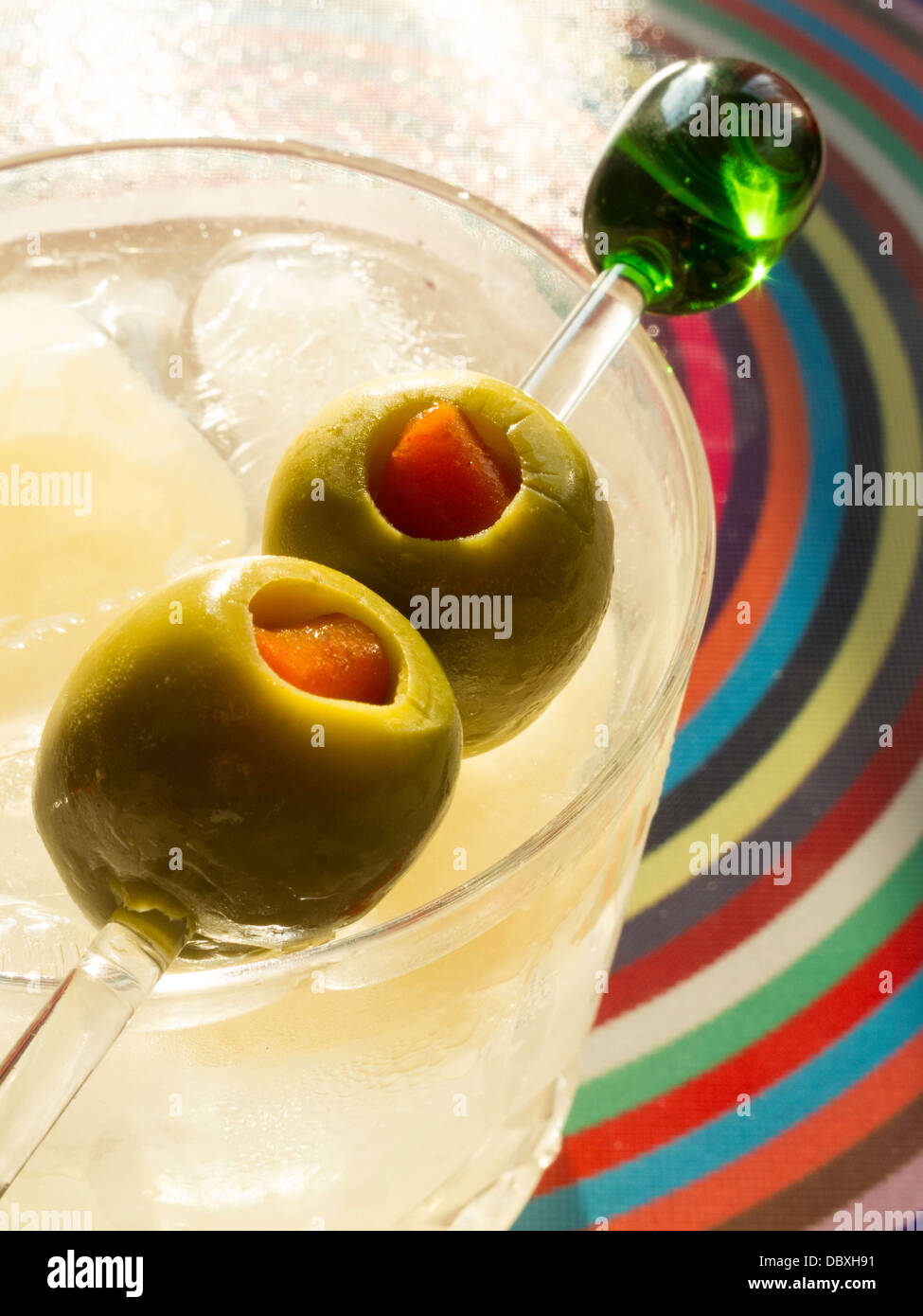 Martini with Olives on the Rocks in a Waterford Crystal Tumbler Stock Photo