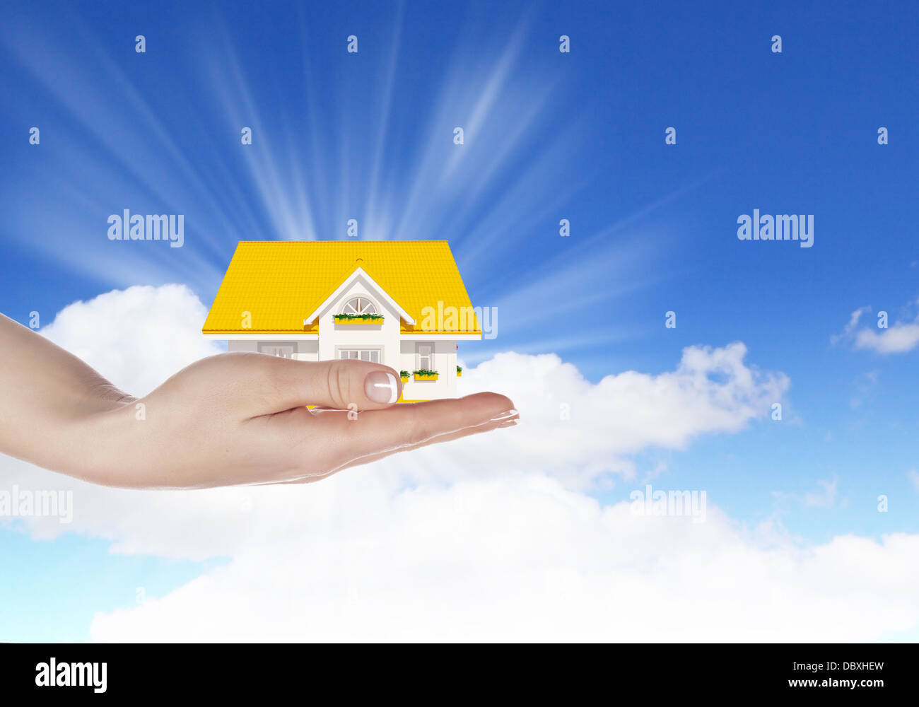 the house in hands on blue sky Stock Photo - Alamy