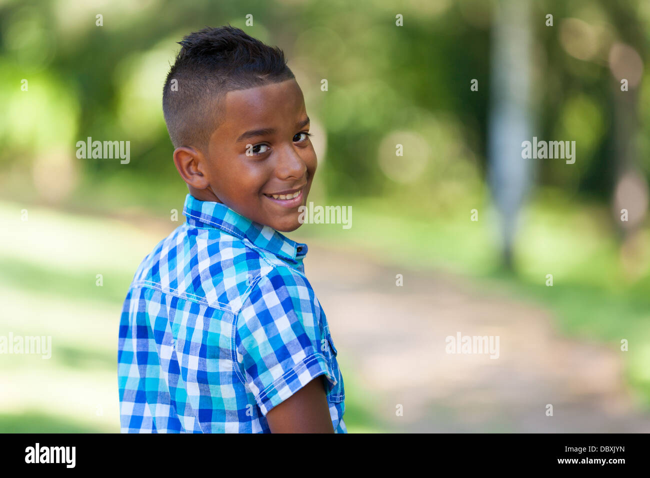 Outdoor portrait of a cute teenage black boy - African people Stock Photo